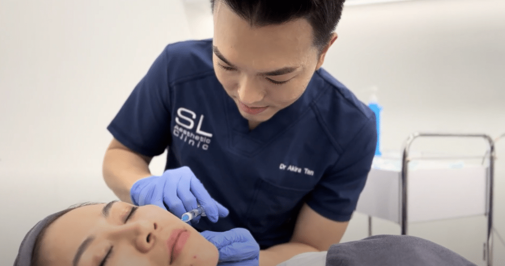 Dr Akira Tan Doing Treatments