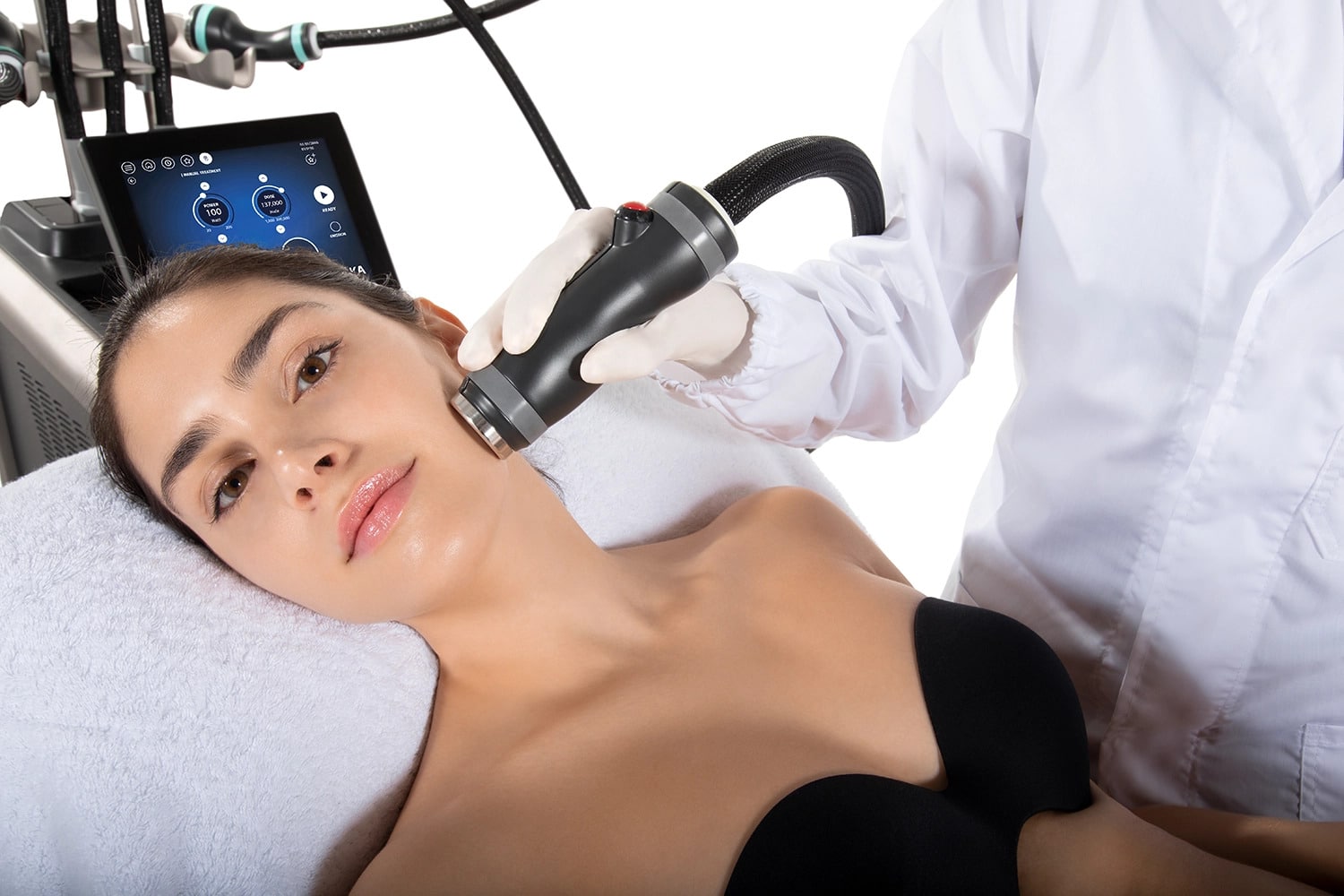 A patient under-going a fat reduction on face using Onda Pro from an Aesthetic Clinician